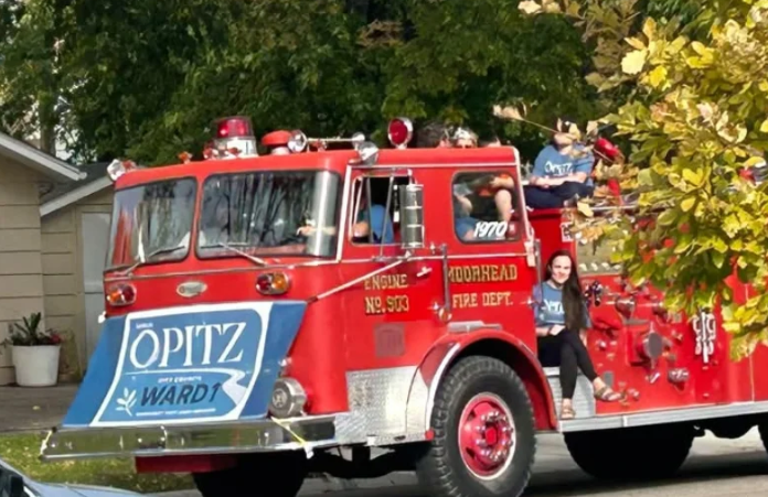 Moorhead City Council candidate Sarah Opitz’s use of fire truck during parade goes to a hearing — Minot Government news